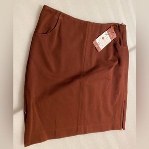 New above the knee skirt with side zippers